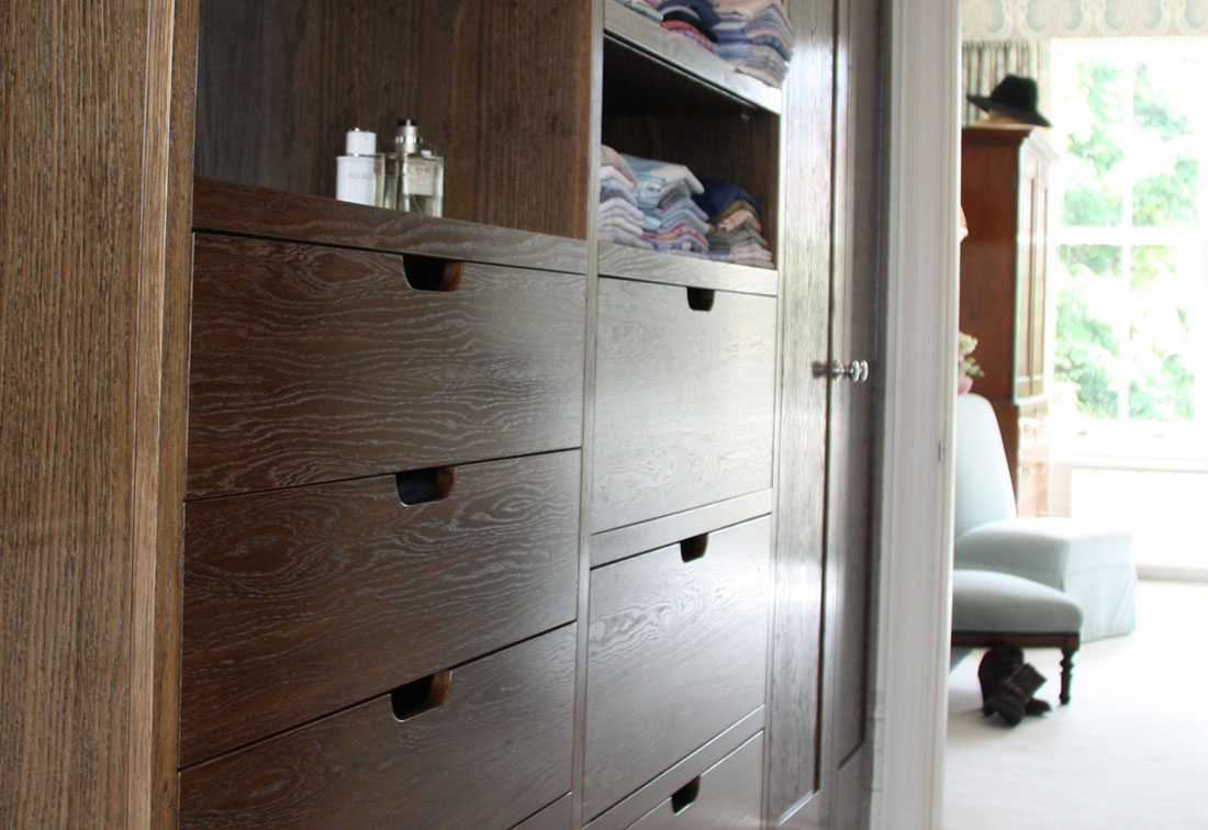 South West London dressing room with bespoke wooden cupboards designed by interior designer Suzi Searle