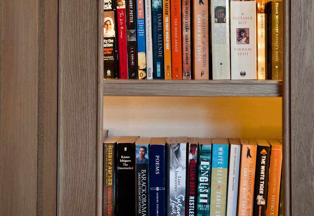 Close up of bespoke wooden bookcase in Wimbledon home, designed by Suzi Searle Interiors