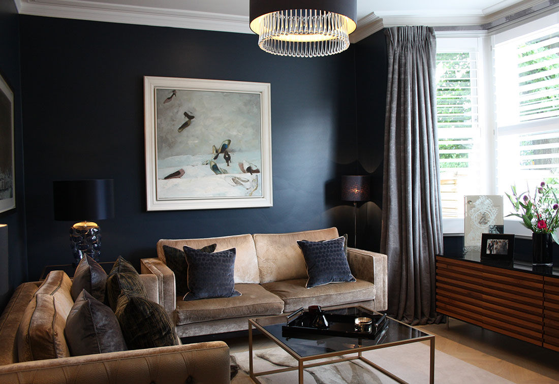 Interior design sitting room in West London by Suzi Searle Interiors with a luxury brown and dark blue colour scheme